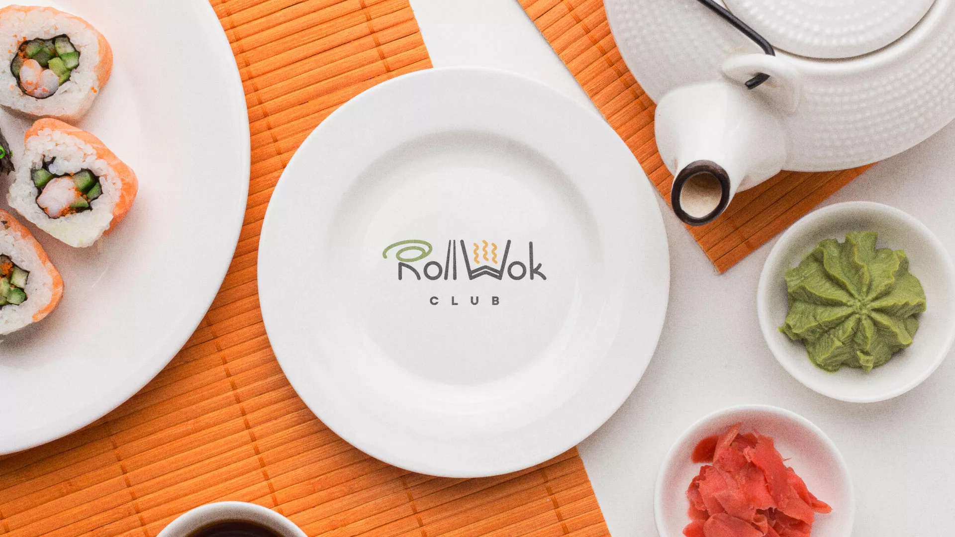 Разработка логотипа и фирменного стиля в Мурино для суши-бара «Roll Wok Club» Разработка логотипа и фирменного стиля в Мурино для суши-бара «Roll Wok Club»